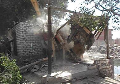 إزالة 15 تعدي على مجارى مائية بالصف